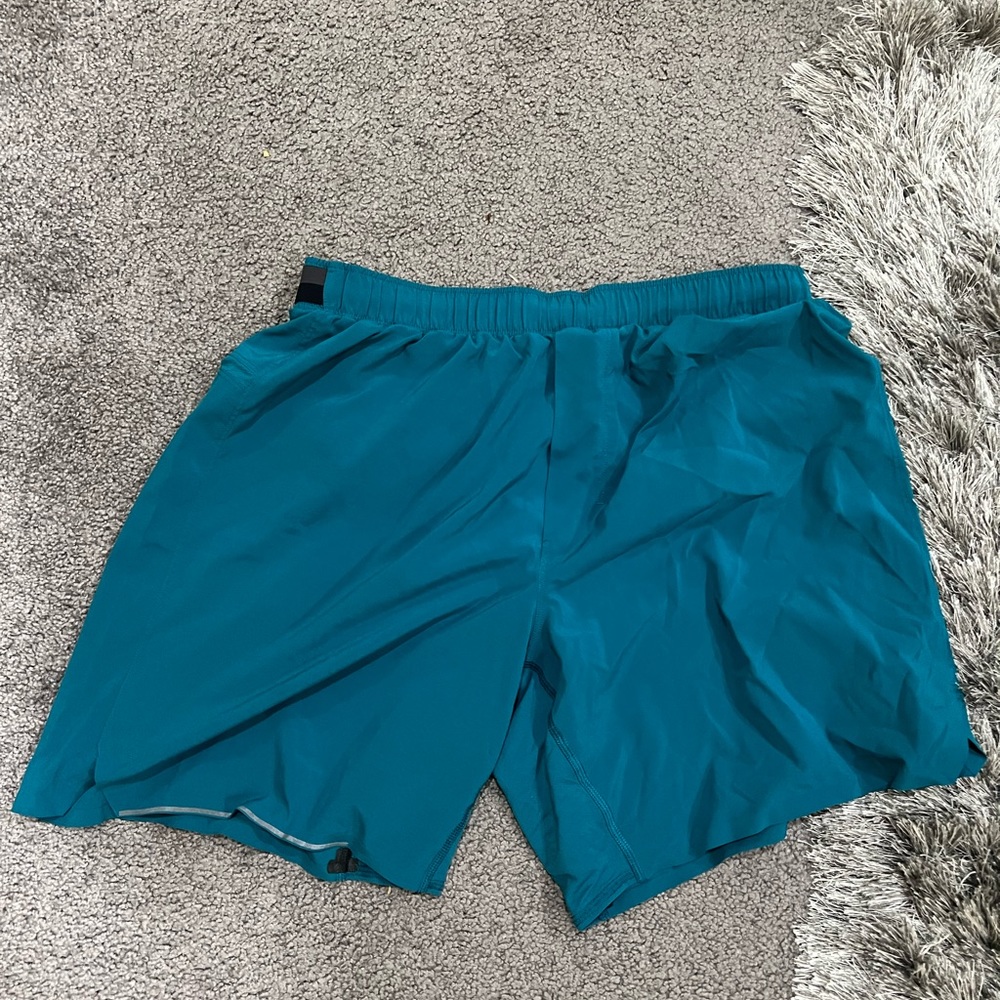 Medium 7 inch no liner teal surge shorts